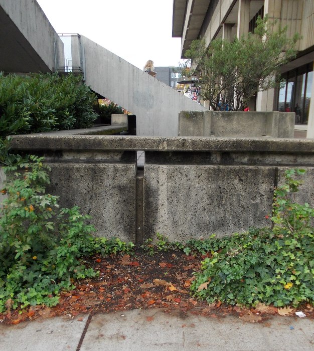 Direct route to the bus stop includes jumping this wall