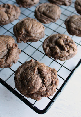 These dark and delicious mocha chocolate chunk cookies are full of chocolate and coffee flavor. Your favorite baristas are going to miss you when you start eating your mocha instead! mocha chocolate chunk cookies on cooling rack