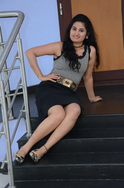 Ankitha Latest Pics Long Cross Legs Thigh Stills In Black Skirt Navel Queens