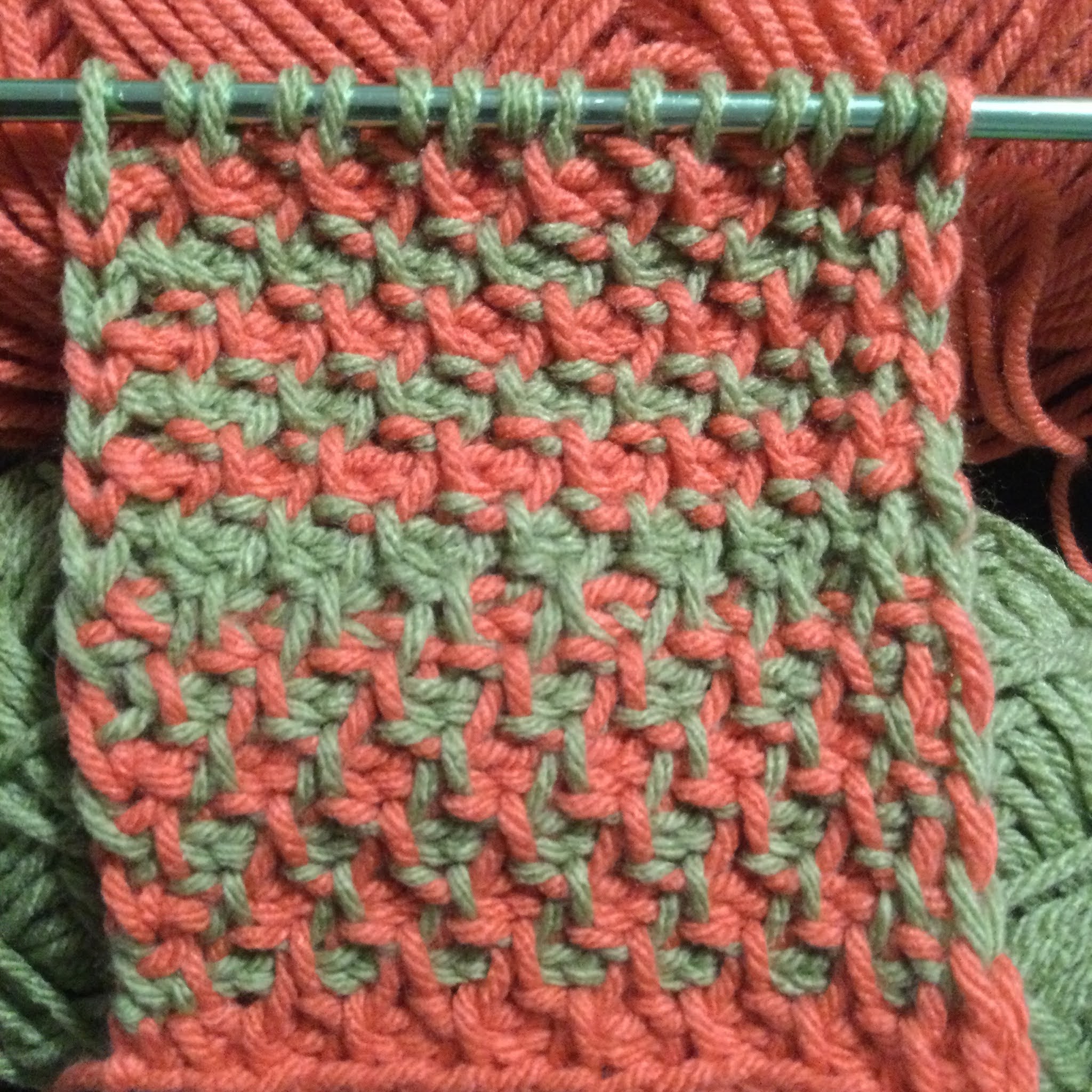 Creating a two color Tunisian Crochet Stitch.