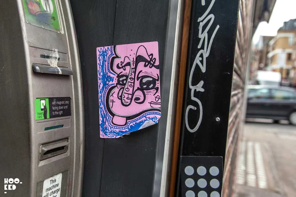 Shoreditch street art stickers - Artist Unknown