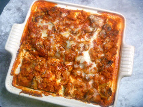 Essential Lasagna: Nothing spells comfort more than layers of steaming tender pasta filled with gooey meat and cheese, topped with a robust sauce that is bursting with flavor.  - Slice of Southern