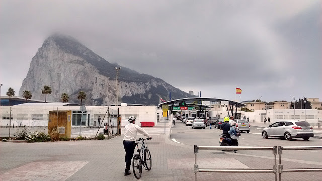 Photo of the border crossing facility between La Linea de la Concepcion, Spain, and the British territory of Gibraltar, including everyday vehicle and foot traffic.