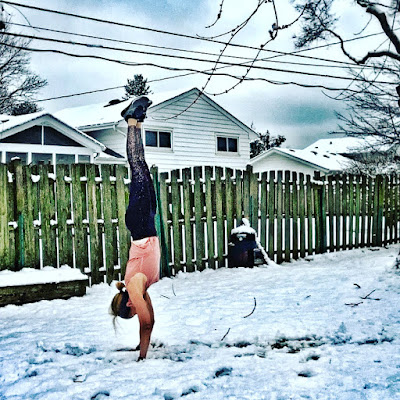 I can't do HSPUs but I can do a handstand. In the snow.