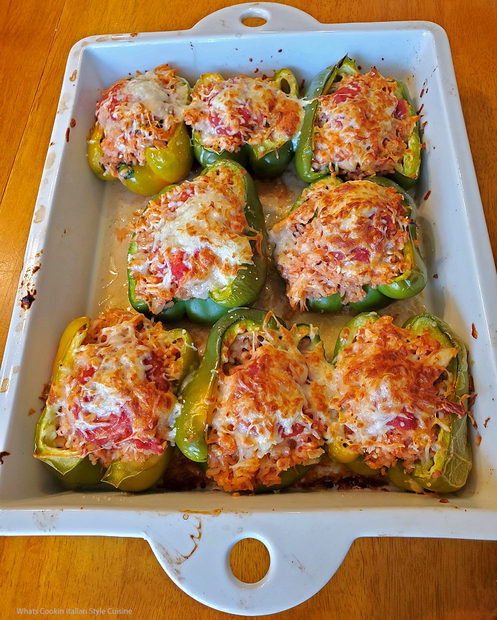 this is a casserole of stuffed bell peppers the filling is chicken rice and topped with cheese