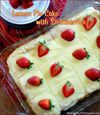 Lemon Pie Cake with Strawberries is a summer celebration. Just 6 ingredients are needed for this lemony cake studded with fresh strawberries. | Recipe developed by www.BakingInATornado.com | #recipe #cake