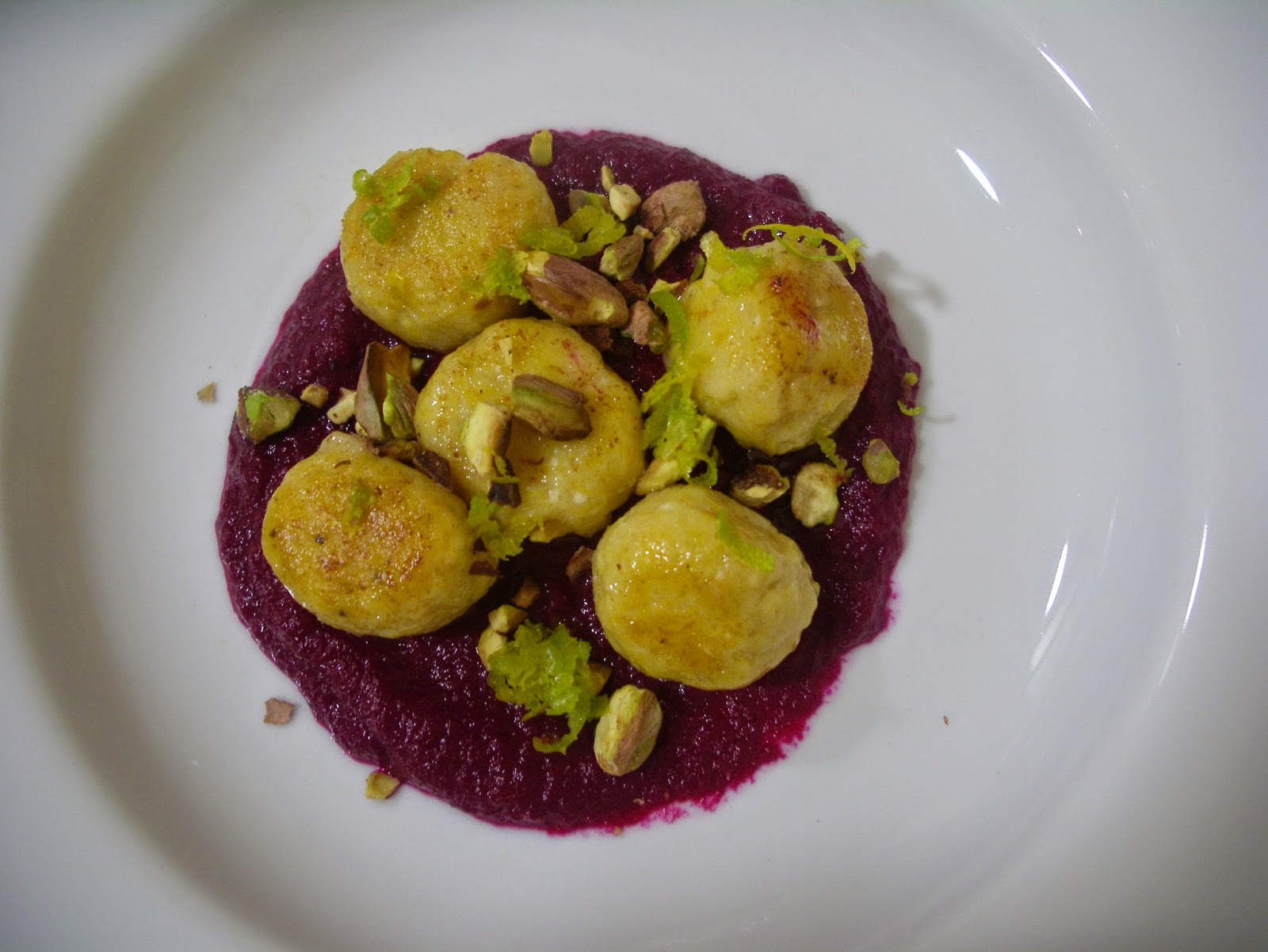 KITCHEN IN THE SAND Pumpkin ricotta gnocchi on beetroot sauce with
