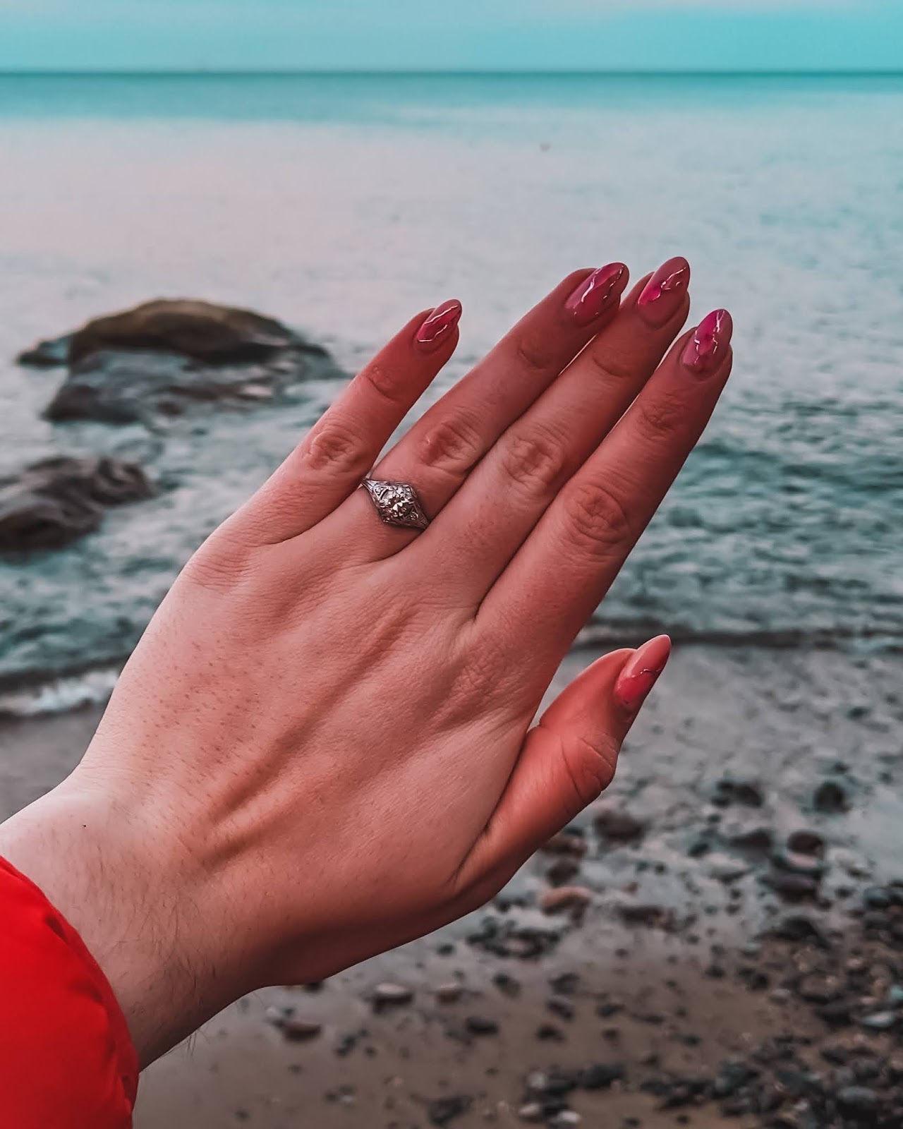 art deco engagement ring beach sunset manicure sea 