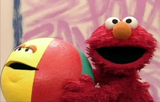 Elmo and the beachball start bouncing together. Elmo's World Balls Interview