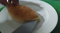 Slicing panini bread with knife Food Recipe