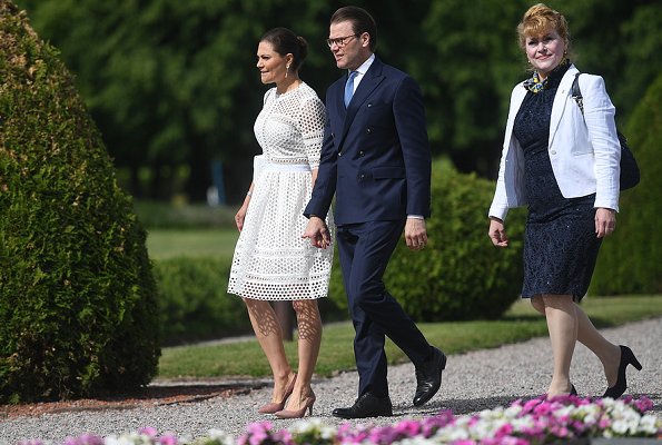 Crown-Princess Victoria wore By Malina Emily Midi Dress, Gianvito Rossi pumps and she carried Ralph Lauren Ricky chain bag, Sweden's National Day 2018