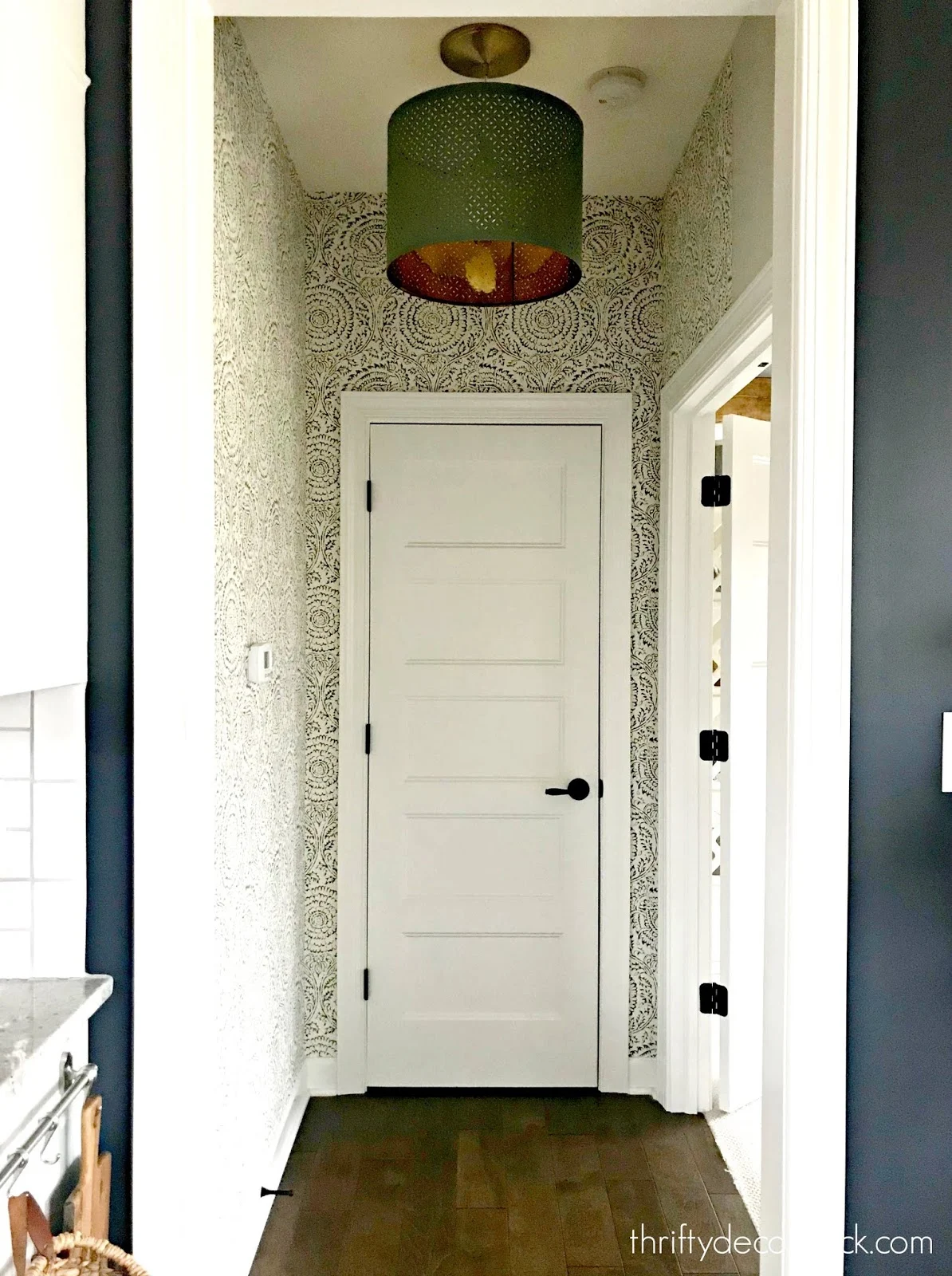 Wallpapered small hallway