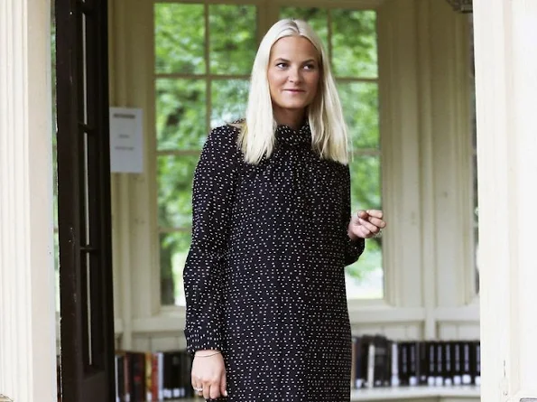 Crown Princess Mette Marit of Norway attended a event. wore Valentino print floral dress