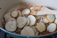 Potatoes for tomato soup with sausage, spinach, and potatoes