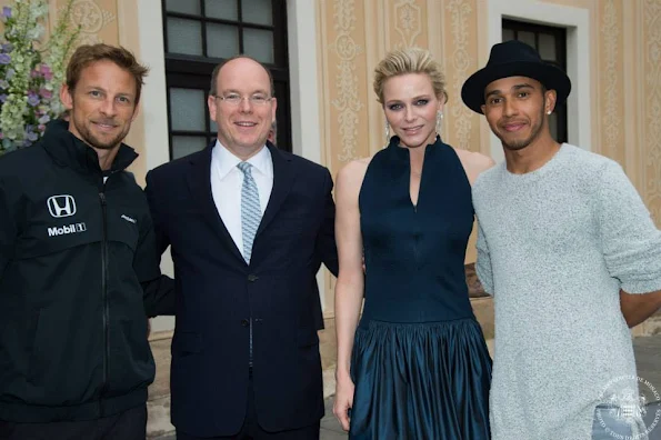 Prince Albert of Monaco and Princess Charlene of Monaco hosted an cocktail party in the Princely Palace courtyard on May 23,2015 in Monaco. 