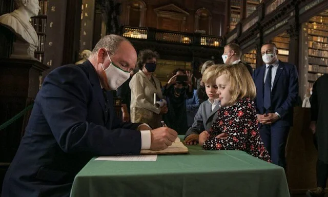 Princess Gabriella wore an evita corduroy dress by Jacadi. President Michael D Higgins and Sabina. Princess Charlene