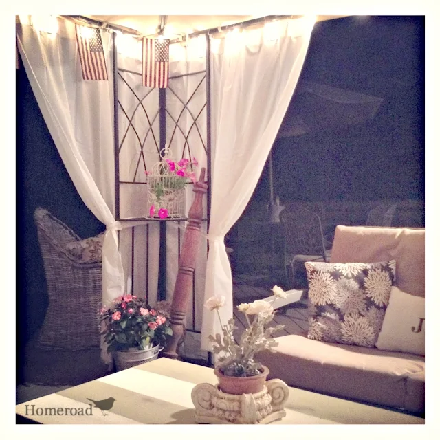 Night view of outdoor gazebo with curtains