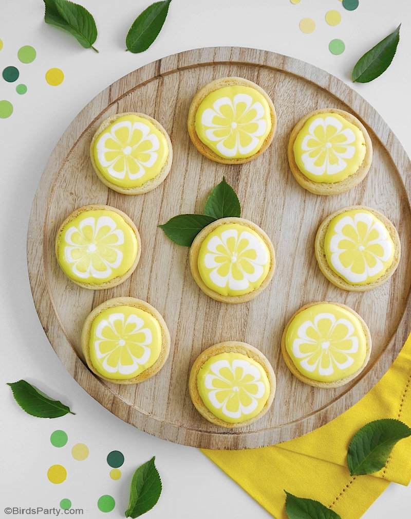Lemon Decorated Sugar Cookies - easy recipe for a lemon shaped sweet treat that's perfect for a lemon themed wedding, birthday or summer party! by BirdsParty.com @birdsparty #cookies #lemoncookies #decoratedcookies #lmeonsugarcookies #sugar cookies #lemondecoratedcookies #lemonrecipes #lemonparty #lemonpartyfood