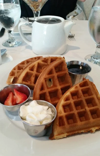 Waffles with strawberries and cream