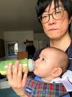 Hwan bottle-feeding Sora.