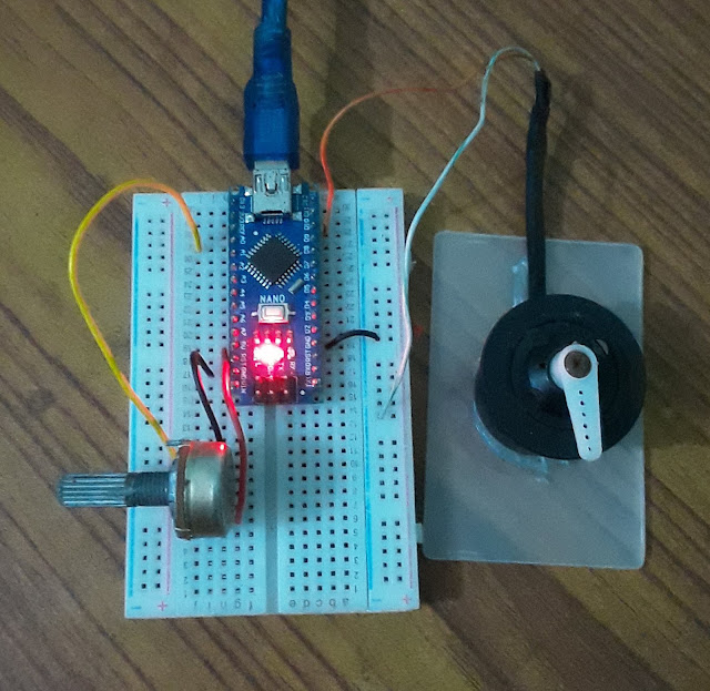 Arduino Nano with Potentiometer and DC motor on a breadboard