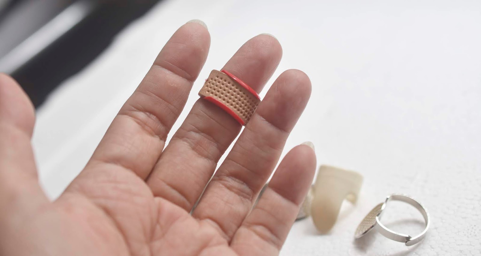 How To Use A Thimble Ring