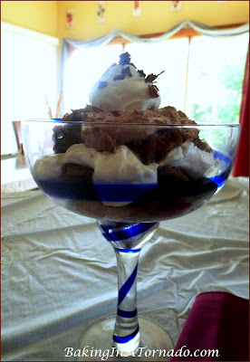 Biscotti Tiramisu Trifle, coffee soaked biscotti, spiked filling and flavored whipped cream come together to create this decadent dessert | Recipe developed by www.BakingInATornado.com | #recipe #dessert 