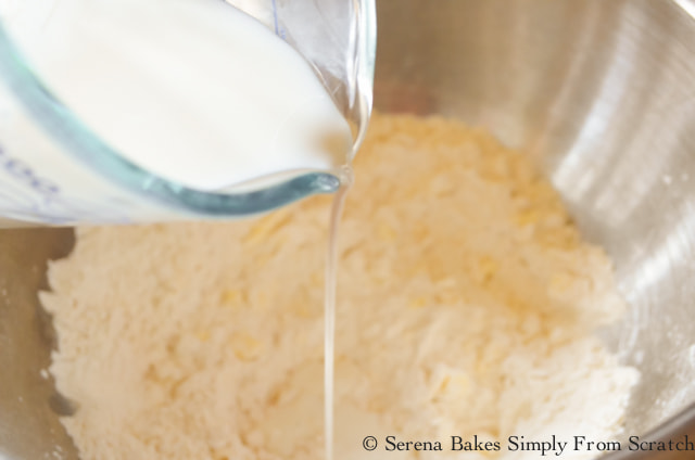 Slowly stir in milk to flour mixture to make Biscuits and Sausage Gravy.