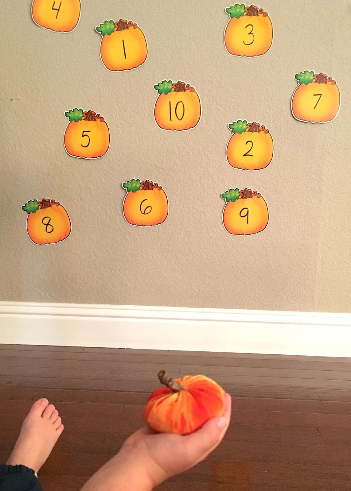 Toddler Approved! Pumpkin Number Toss Game for Kids