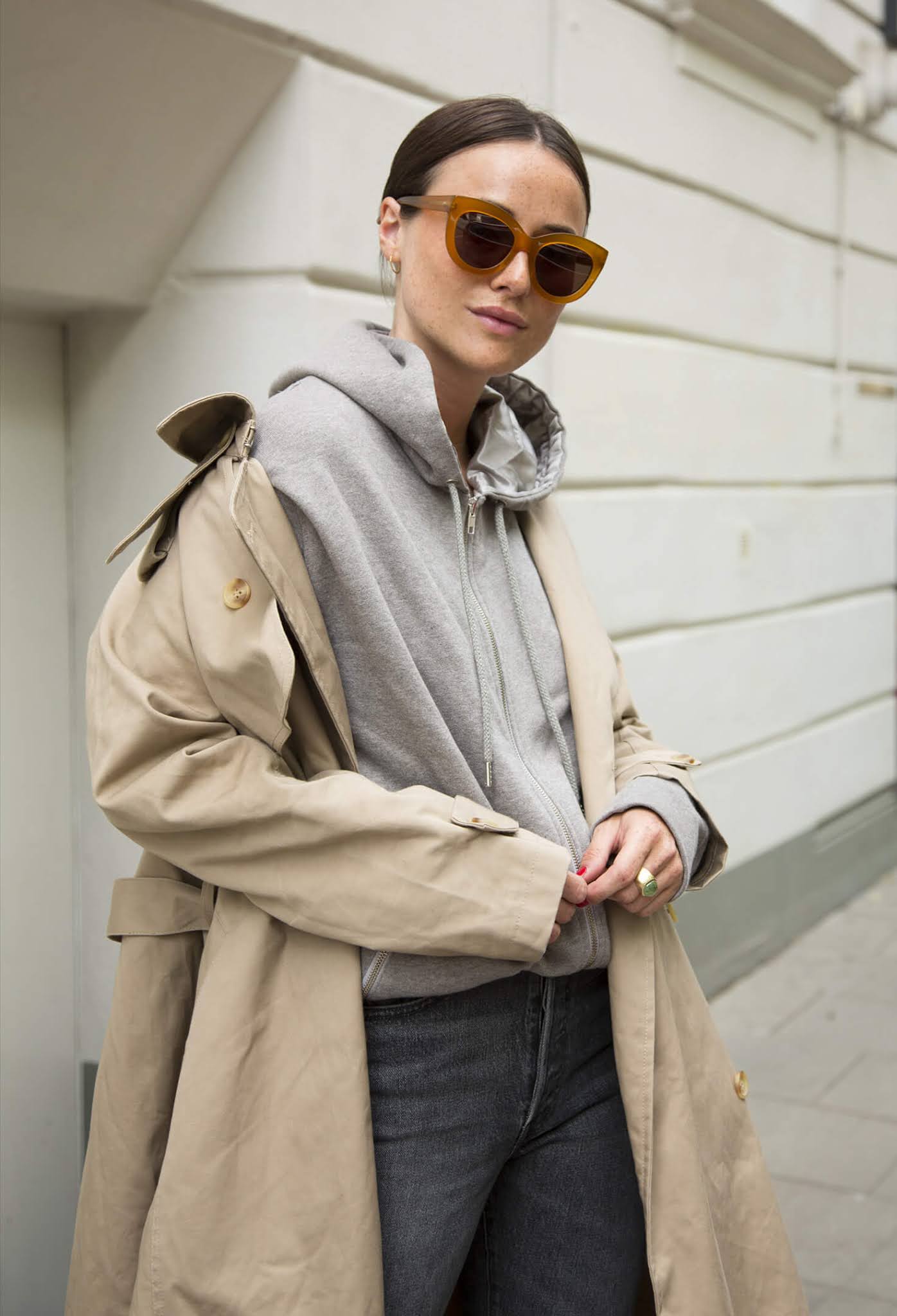 A Hoodie and Trench Coat Make for the Perfect Spring Outfit Combo