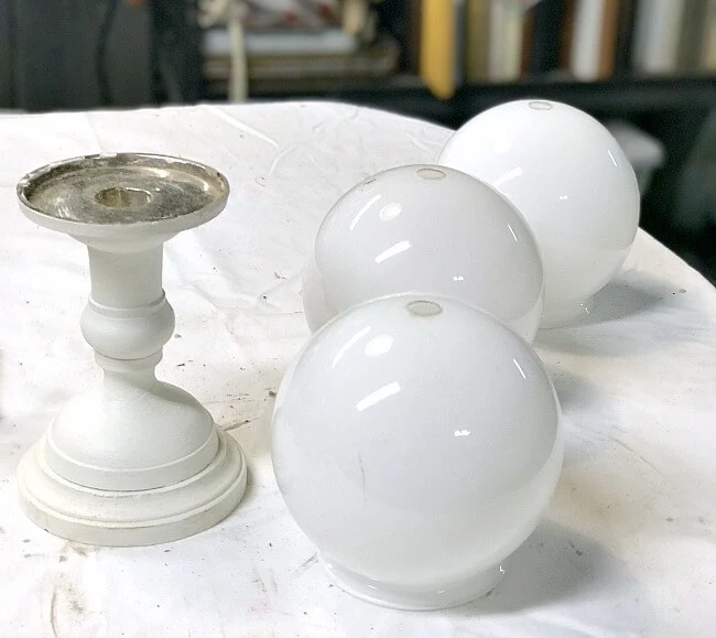 Repurposed snowman supplies using old light globes