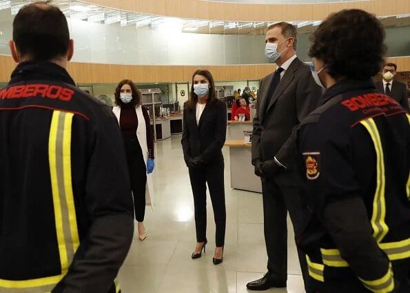 King Felipe and Queen Letizia of Spain visited the 112 Emergency Center in Madrid, Letizia wore Hugo Boss blouse