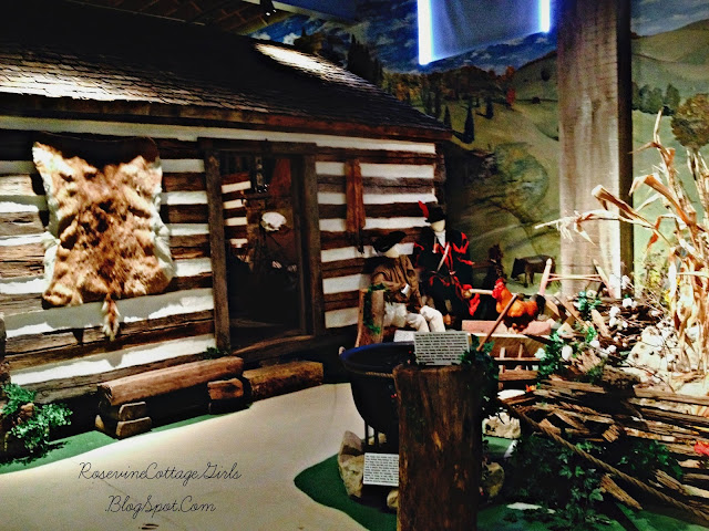Museum of the Barrens in Barren County Kentucky showing a log cabin and other displays.