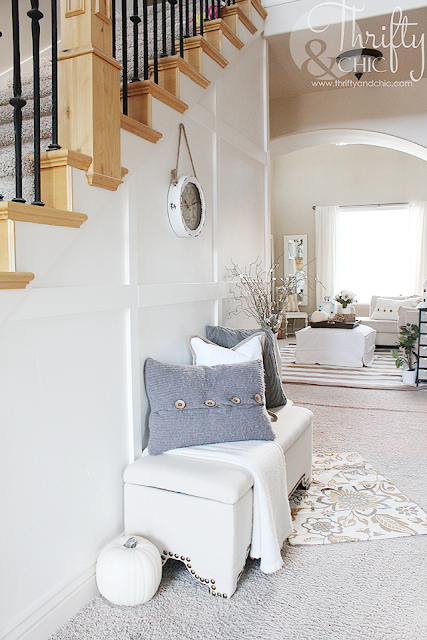 Entryway decor and decorating ideas. White entryway with square board and batten