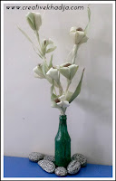 http://creativekhadija.com/2015/11/how-to-make-corn-husk-flowers-bouquet-for-fall/