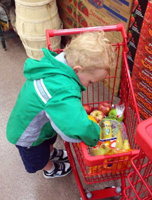 kid with tiny cart