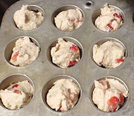 muffins in a muffin tin ready to bake