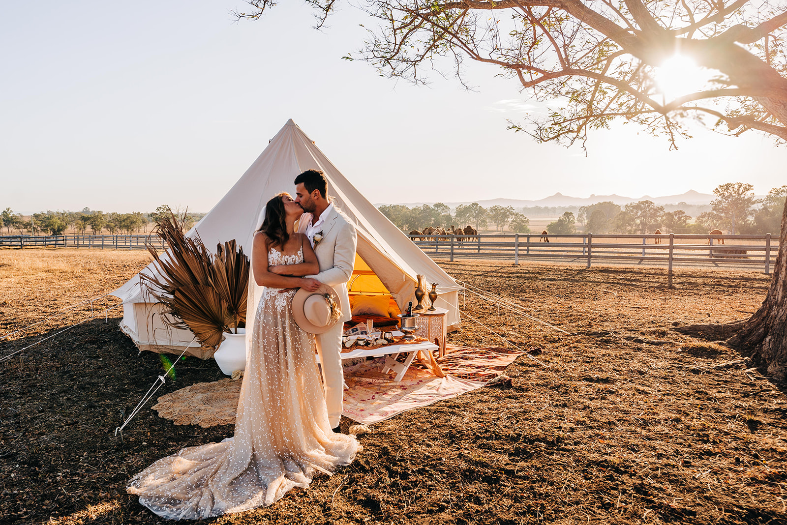 to the aisle australia | champagne at sunrise summer land camels shoot match made photography gold coast weddings country boho floral design cake stationery venue