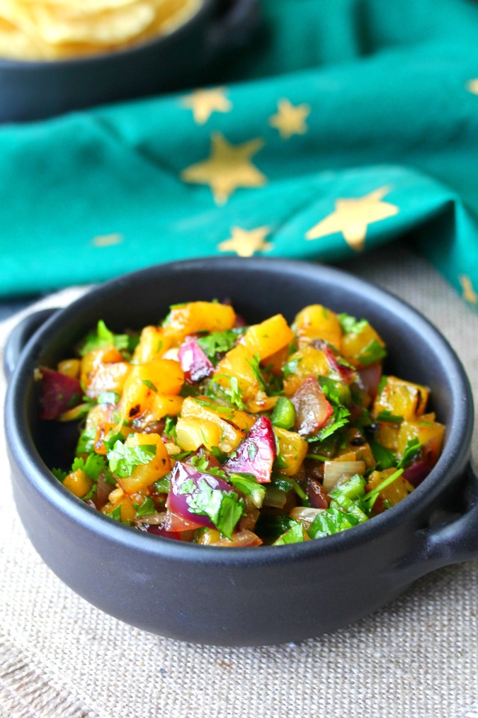 Grilled Pineapple and Red Onion Salsa in a dark grey bowl