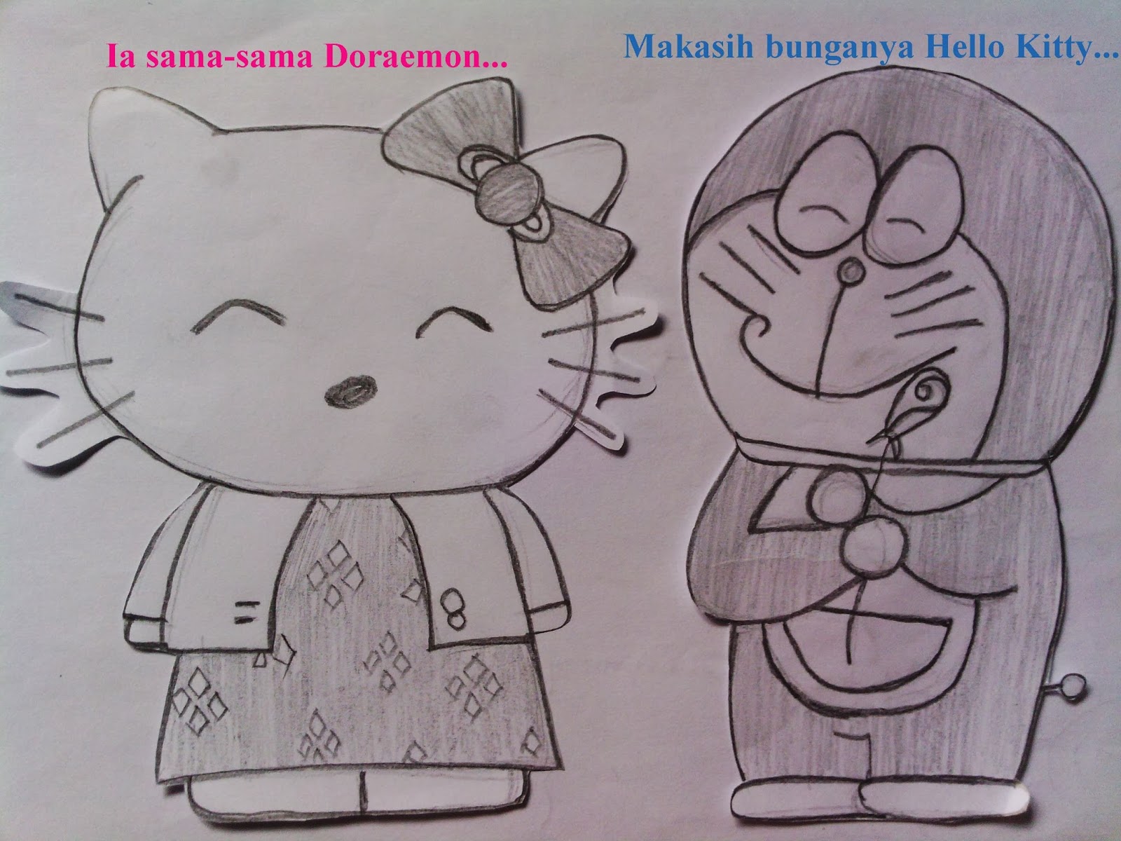 Download this Sedangkan Diarah Lain Hello Kitty Dan Doraemon Sedang Berbicara picture