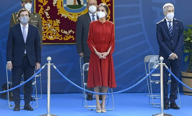 Queen Letizia of Spain wore a red long sleeve flared midi dress by Salvatore Ferragamo