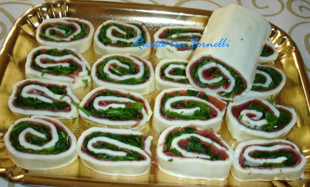 Ricette tra i fornelli Girelle di Mozzarella con Rucola e Bresaola