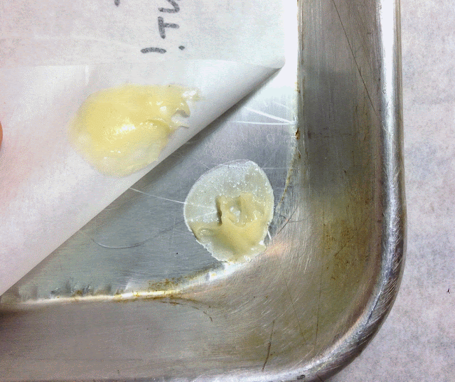 Using Pate a Choux to Glue Parchment to a Sheet Tray Using Pate a Choux to Glue Parchment to a Sheet Tray