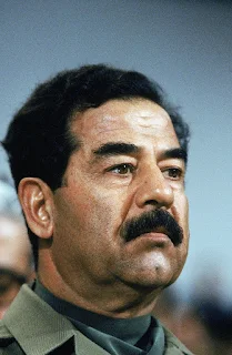 صور صدام حسين