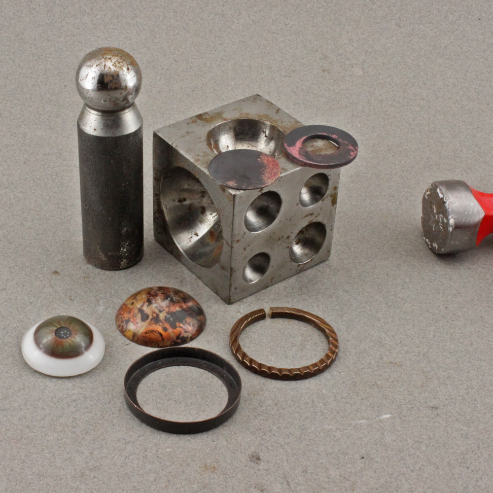 OscarCrow Handmade Jewelry A pendant made using a dapping block with