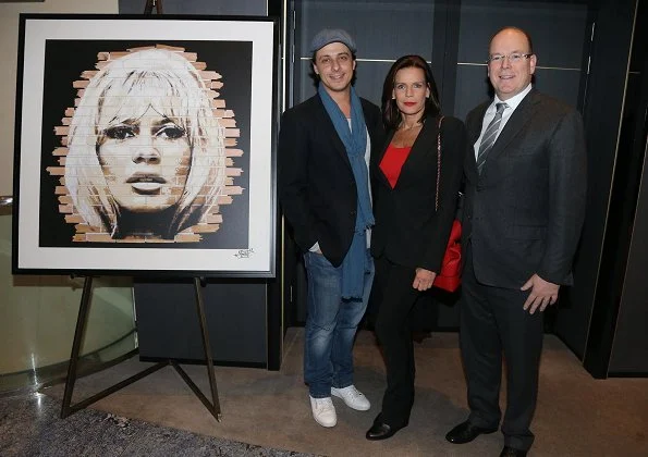 Princess Stephanie, Prince Albert, Camille Gottlieb and Louis Ducruet. Stephanie wore Chanel pantsuit and red top