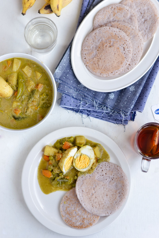 vellayappam with egg curry tea and banana