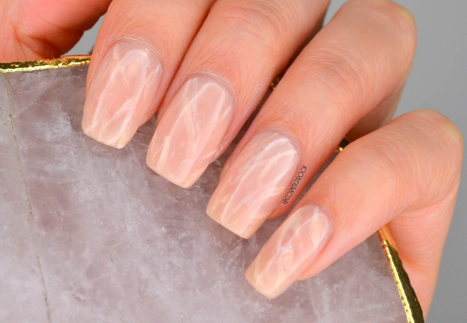 6. "Rose Quartz Nail Art with Crystal Centers" - wide 2