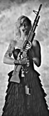 Gin Wigmore with rifle in "Hey Ho"