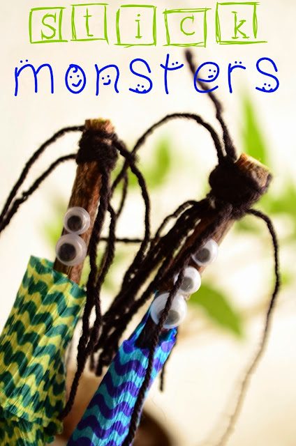 Nature monsters made from sticks, string, and googly eyes.